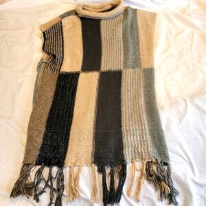 Knit turtleneck fringe poncho